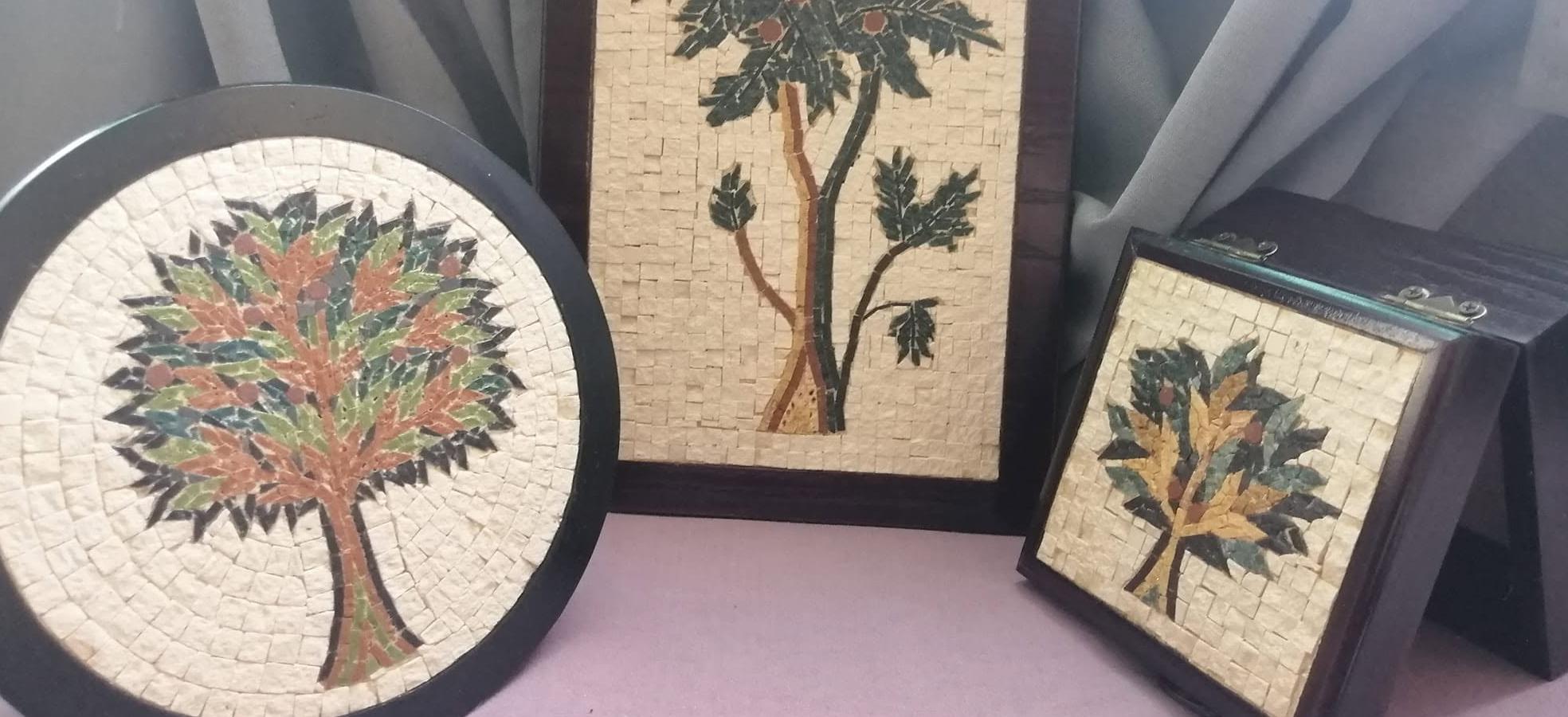 A collection of framed Tree of Life mosaics in different sizes